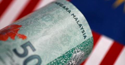 Ringgit gains as US fed signals caution on rate cuts