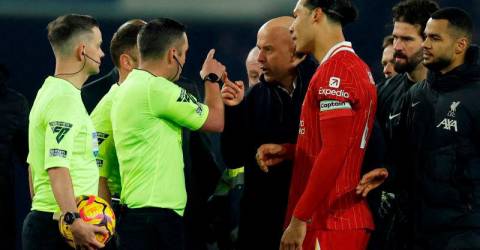 Liverpool boss Slot charged after clashing with officials