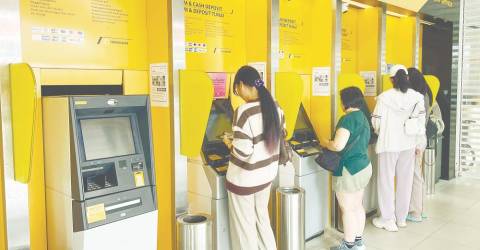 Fresh call for abolition of RM1 ATM fee