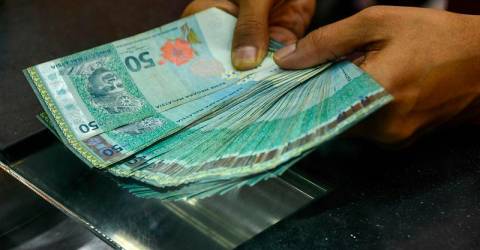 Ringgit opens higher against US dollar