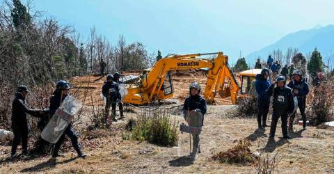 Nepal community fights to save sacred forests from cable cars