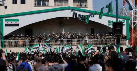 Syrians commemorate uprising anniversary for first time since Assad’s fall