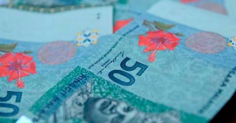 Ringgit opens flat against US dollar