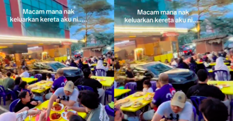 Woman shocked as stall traps parked car with tables & chairs